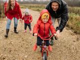 Photo by Yan Krukau: https://www.pexels.com/photo/girl-in-red-jacket-riding-bicycle-5792907/